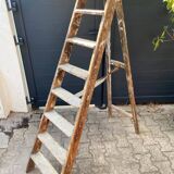 Antique authentic painter's stepladder in vintage patinated wood