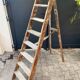 Antique authentic painter's stepladder in vintage patinated wood