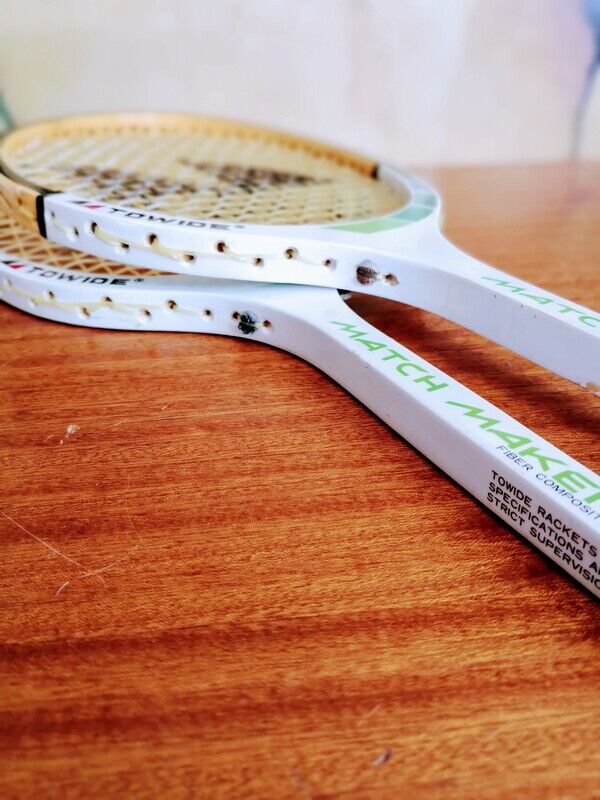 Pair of vintage badminton rackets