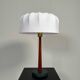 Mid-century teak and cotton table lamp by Einar Bäckström, Sweden, 1950s.