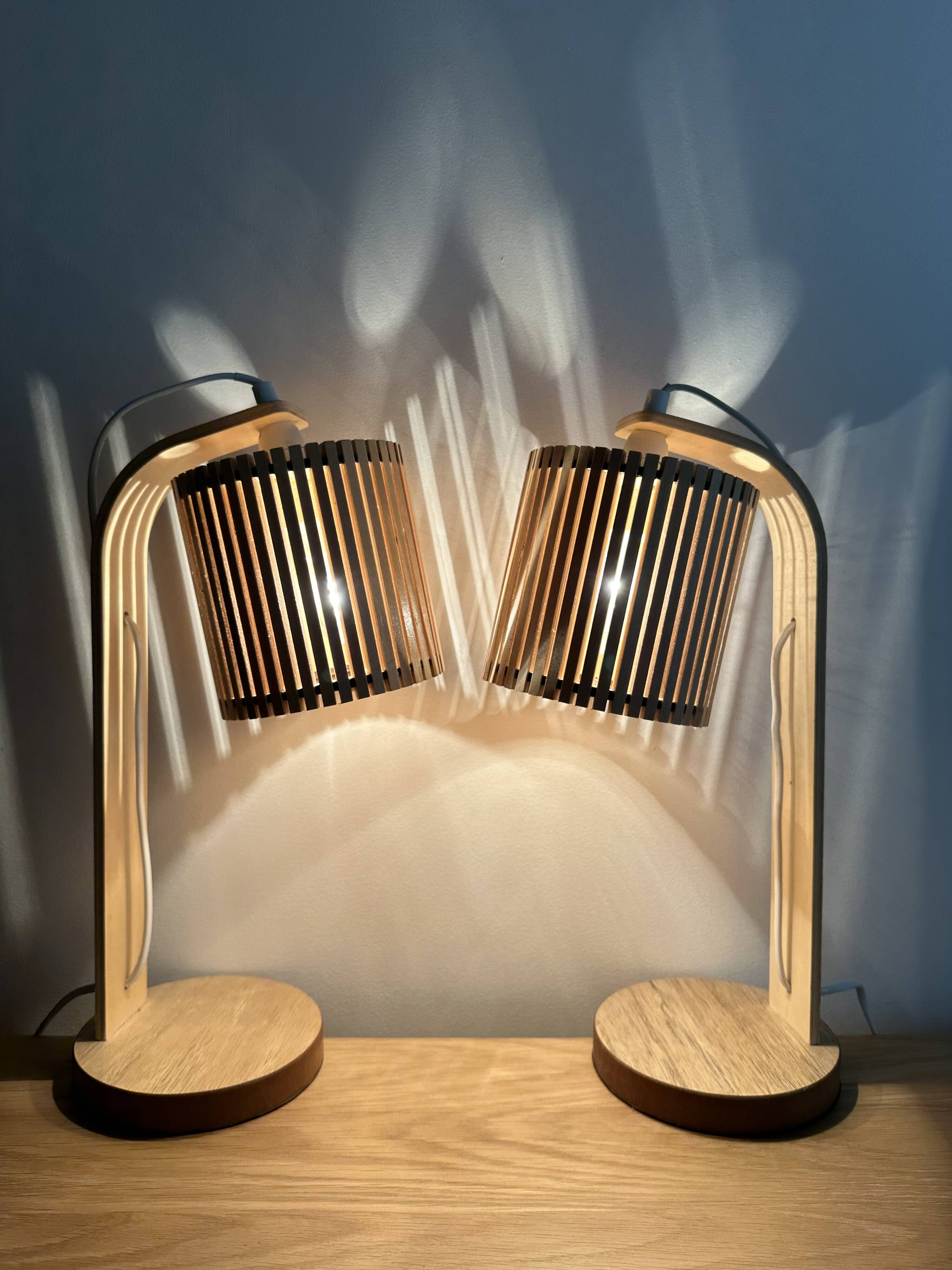 Pair of large Scandinavian lamps in natural wood.