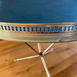 Old neoclassical style pedestal table, gilded bronze.