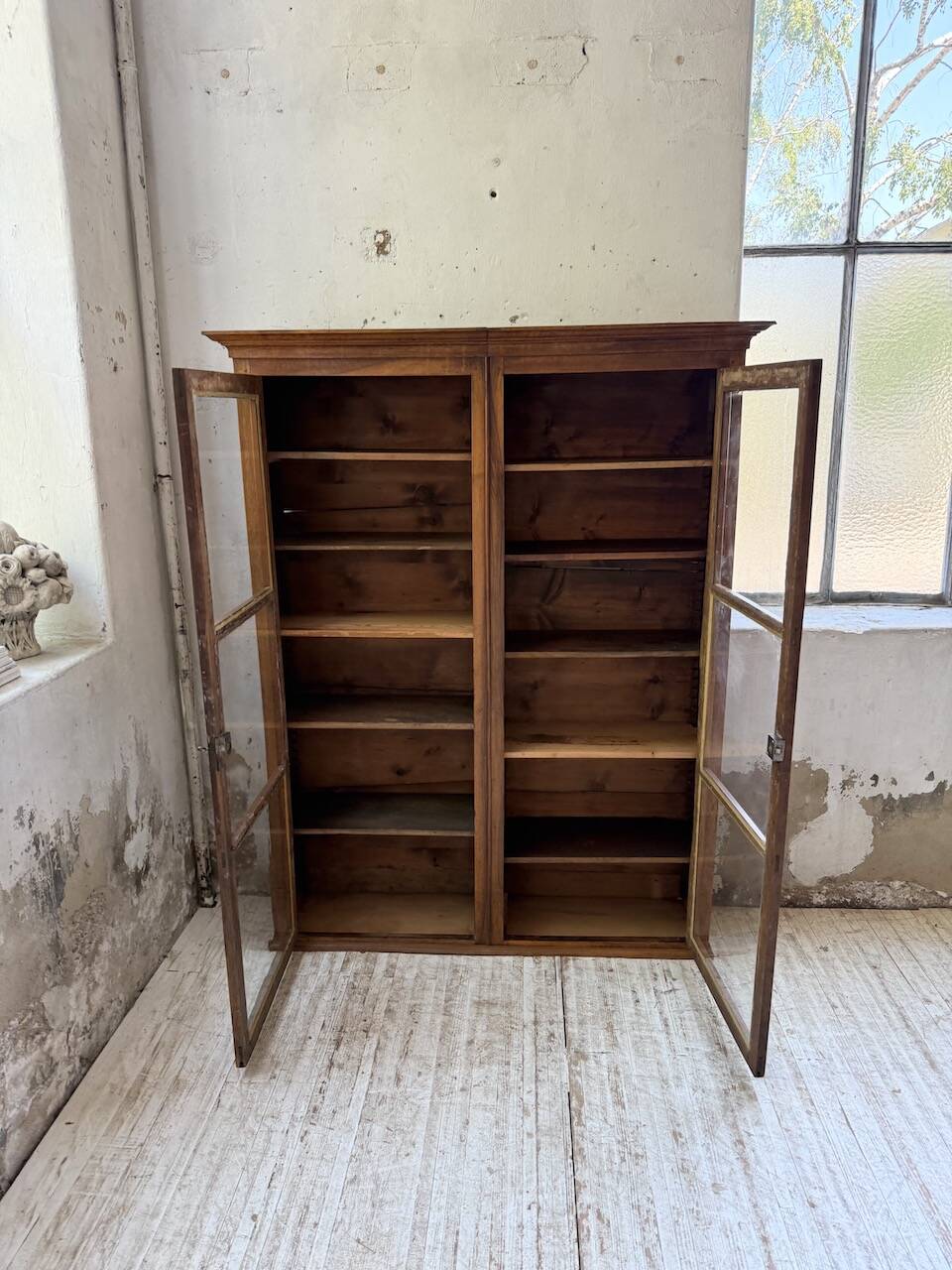Glass-fronted walnut library 1900
