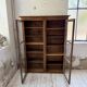 Glass-fronted walnut library 1900