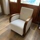 Set of 2 Hungarian Art Deco armchairs from the 1930s — brown wood, cream and beige fabric.