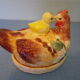 Empty pocket in the shape of a painted ceramic hen