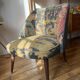 J. Tenreiro, Brazil. Concha armchair with tapered legs, Cluny tapestry 1400.