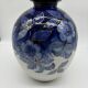 Large Tharaud Limoges vase in cobalt blue porcelain with floral decoration.