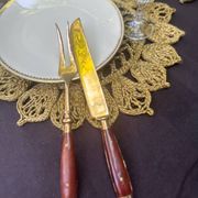 Wood and brass serving utensils