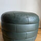 Green patchwork leather pouf from Sède