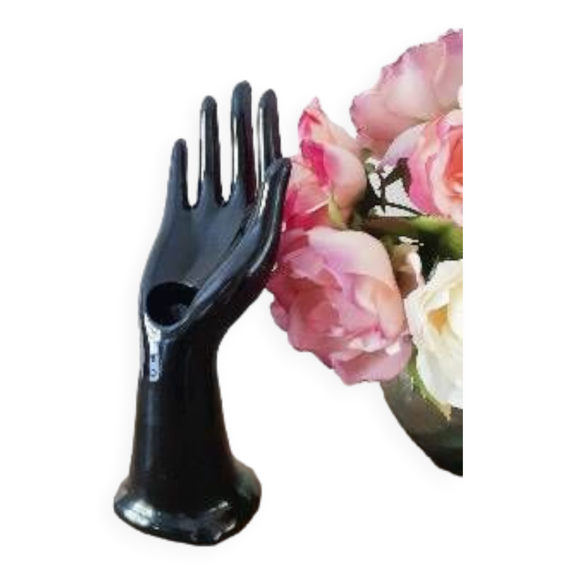 Hand holds black jewelry, ring sizer, soliflore, vintage French, 50s