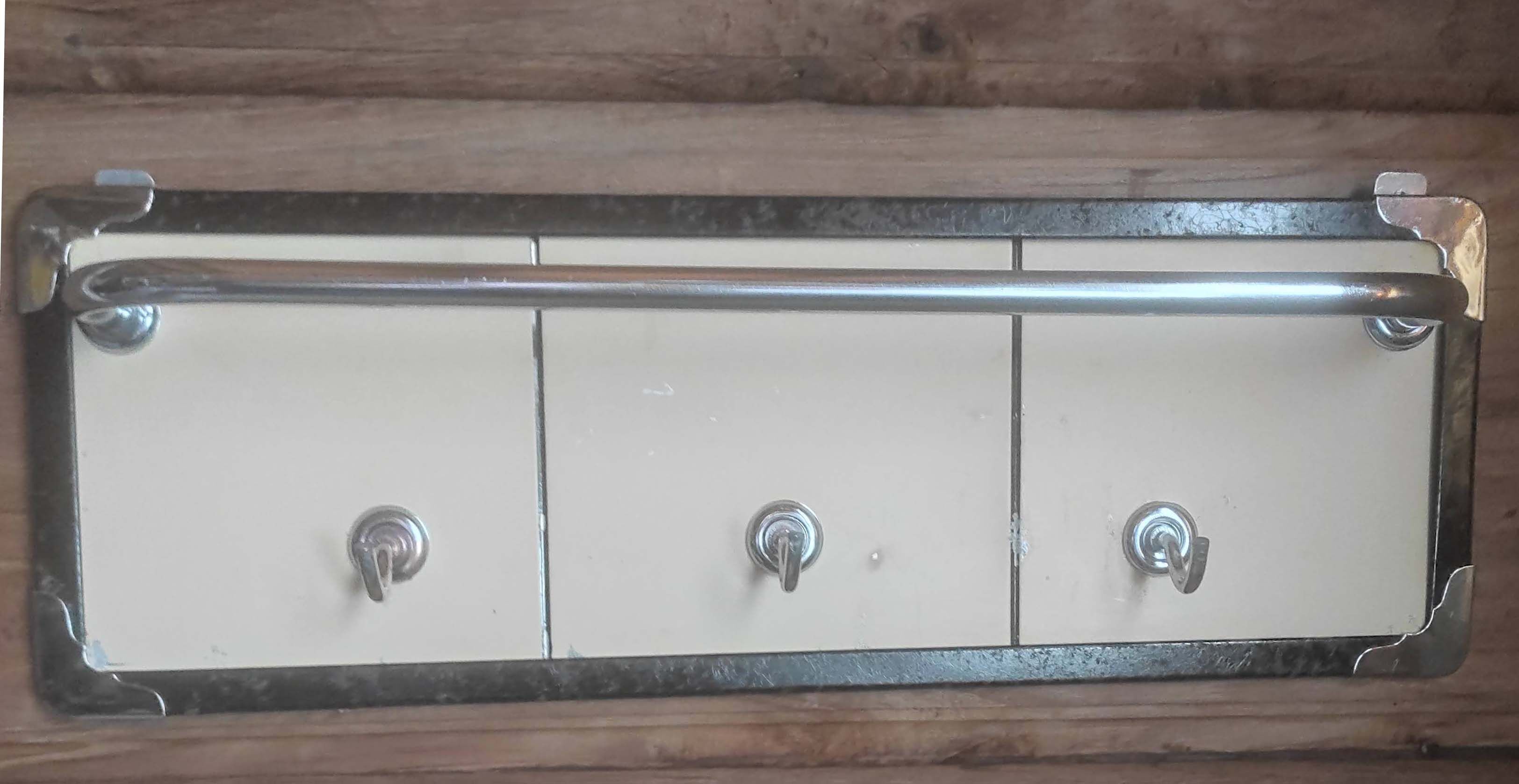 Vintage metal tea towel holder