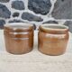 Duo of sandstone pots with handle