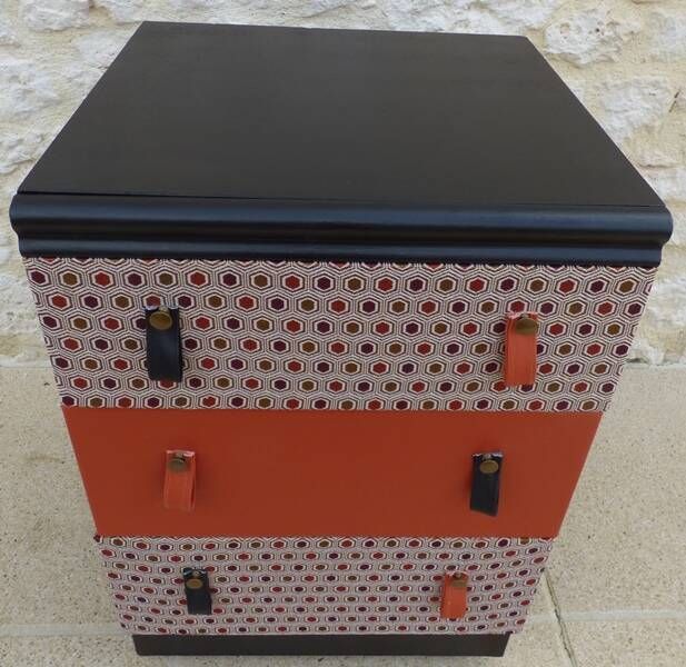 Three-drawer wooden and faux leather chest of drawers on wheels, completely refurbished.