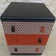 Three-drawer wooden and faux leather chest of drawers on wheels, completely refurbished.