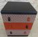 Three-drawer wooden and faux leather chest of drawers on wheels, completely refurbished.