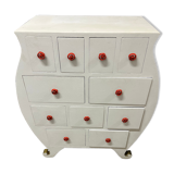 Commode blanche arrondie avec multiples tiroirs