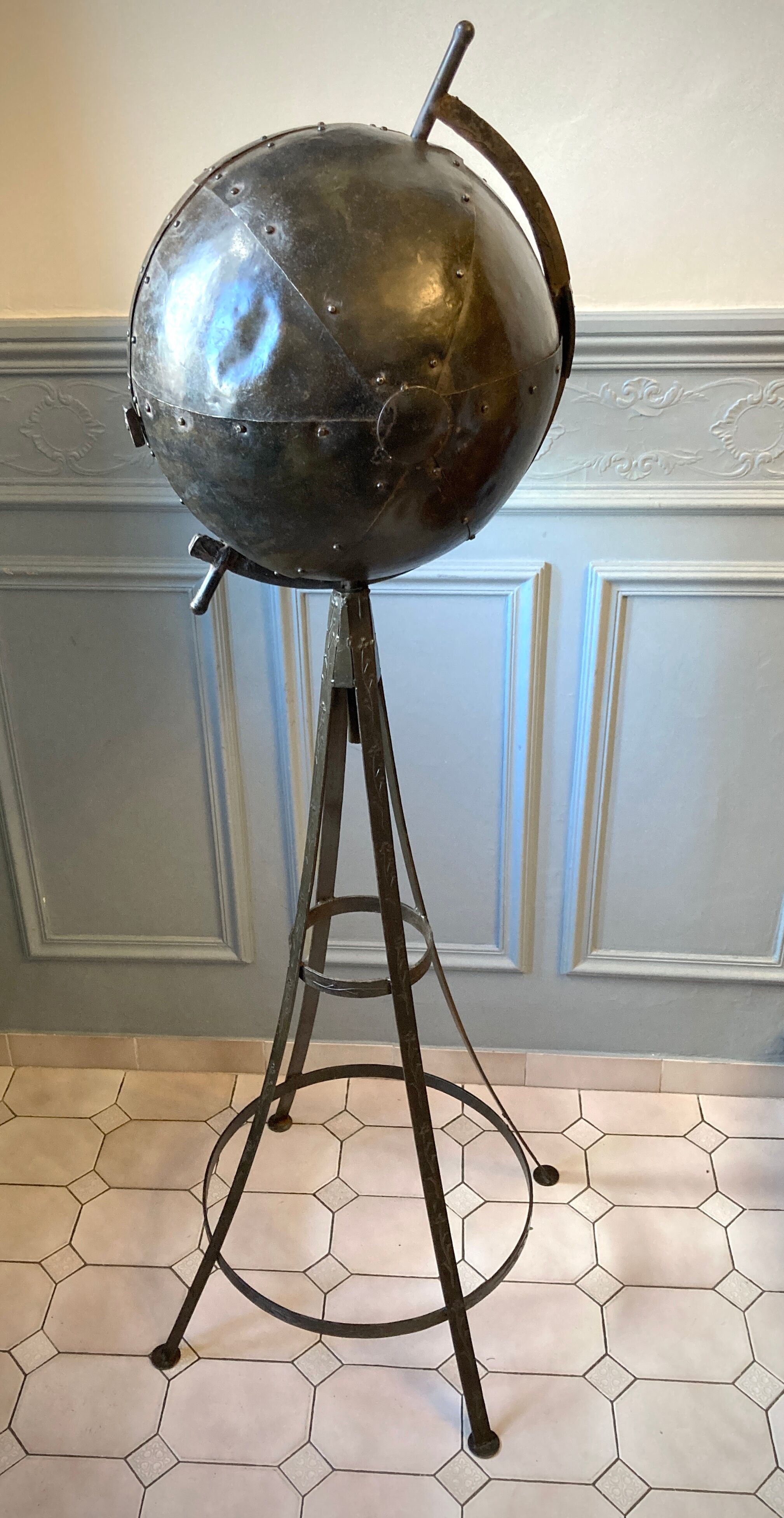 Atypical industrial furniture riveted sphere