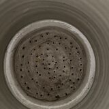 Old pot, sandstone, blue flower decoration