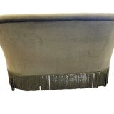 Vintage green two-seater sofa with fringes