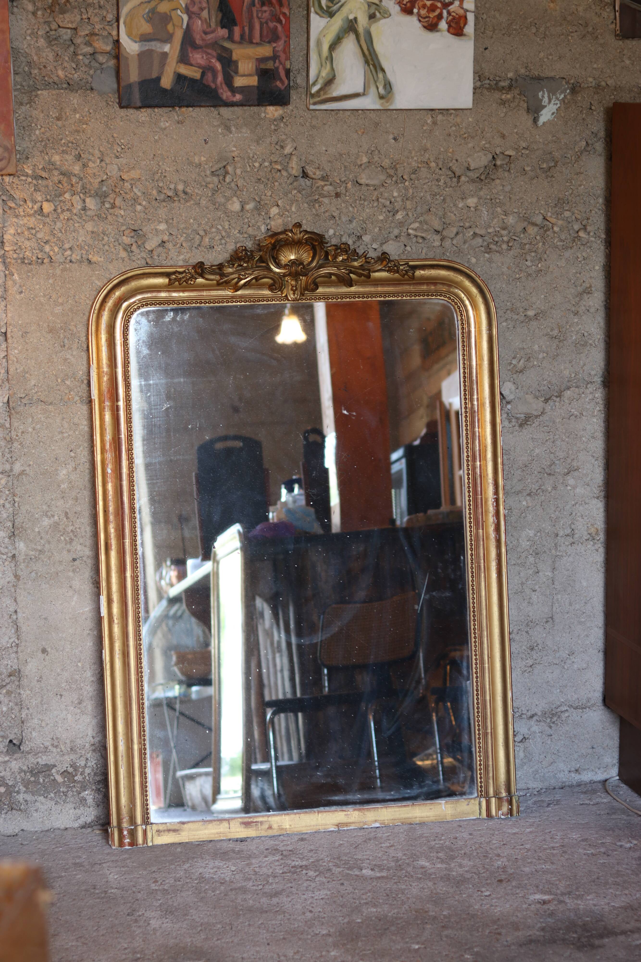 Large Louis XVI style mirror, wood and gilded stucco