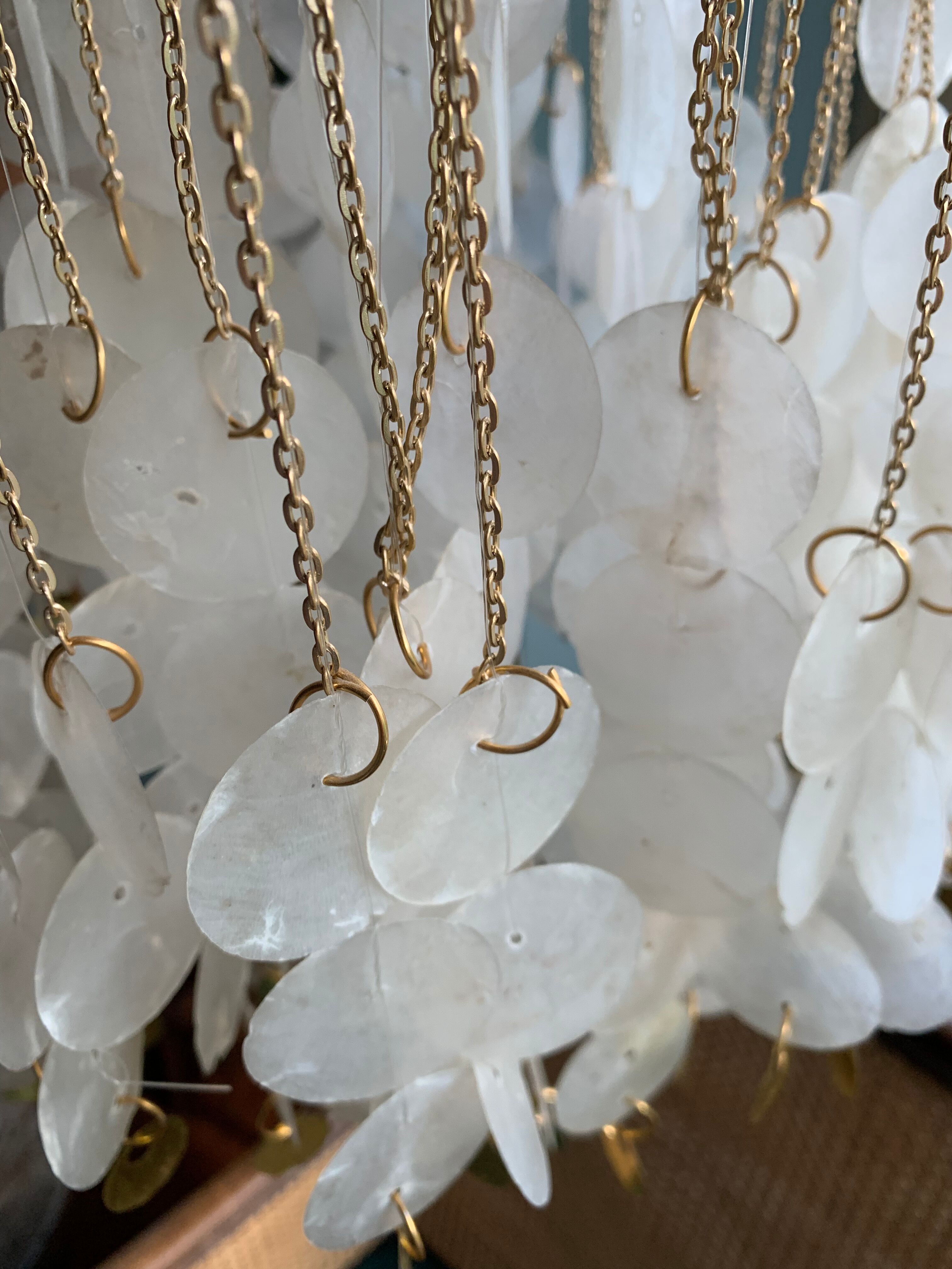 Suspension en pastille de nacre