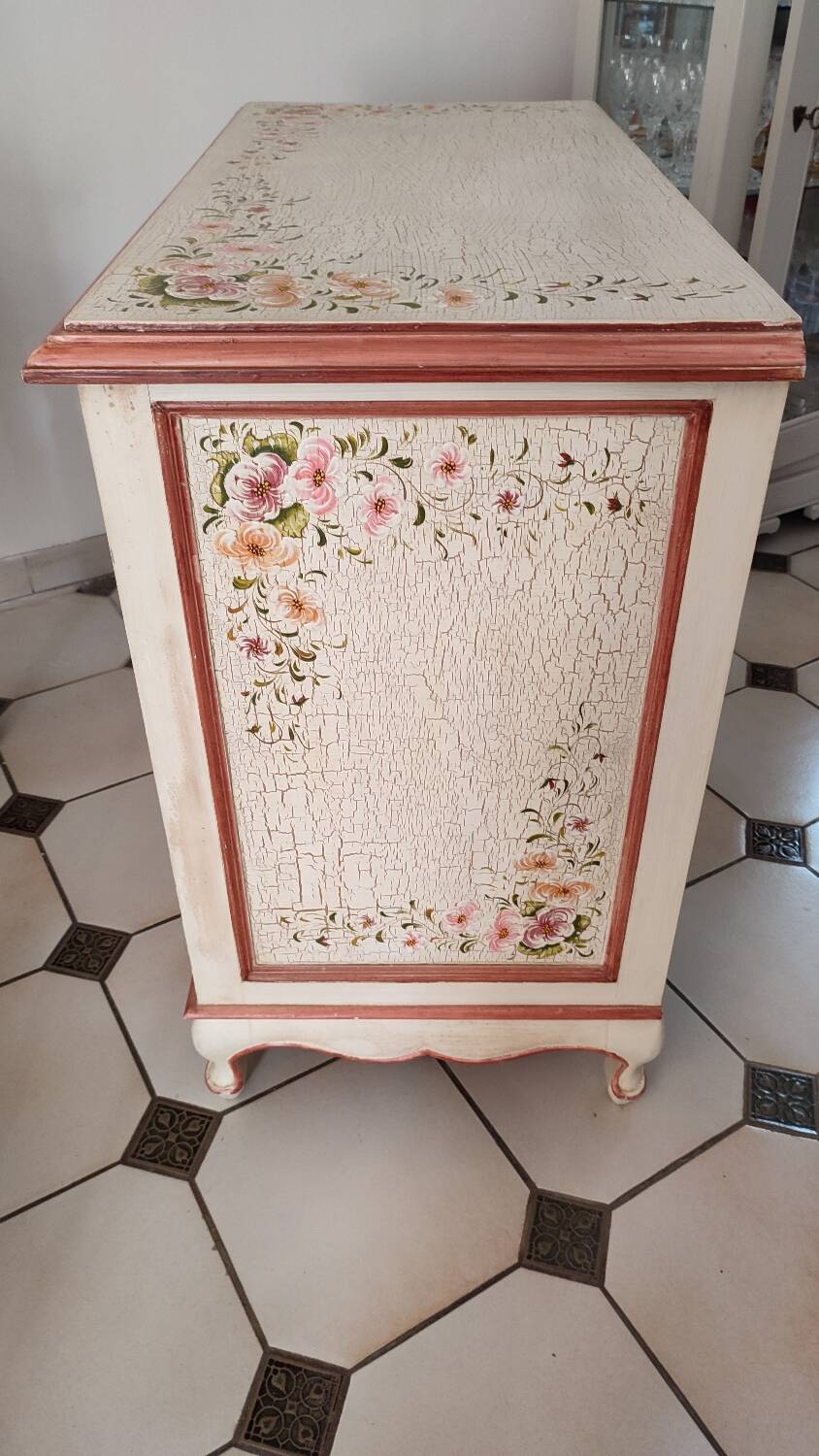 Painted chest of drawers with floral decoration