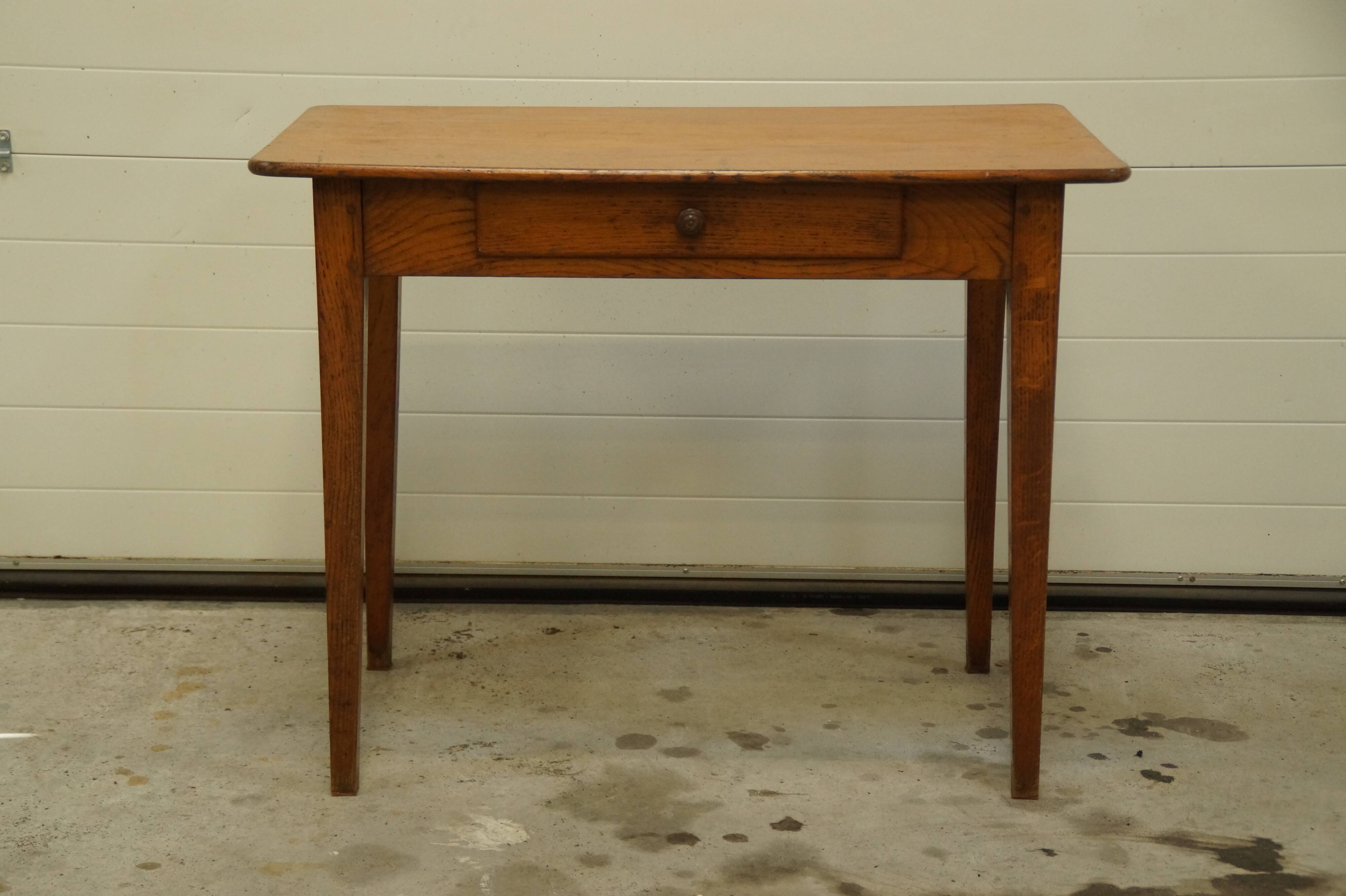 Old desk in chestnut side table