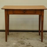 Old desk in chestnut side table