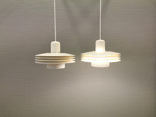 Hanging lamps from Danish ES Horn lighting, produced in the 80s.