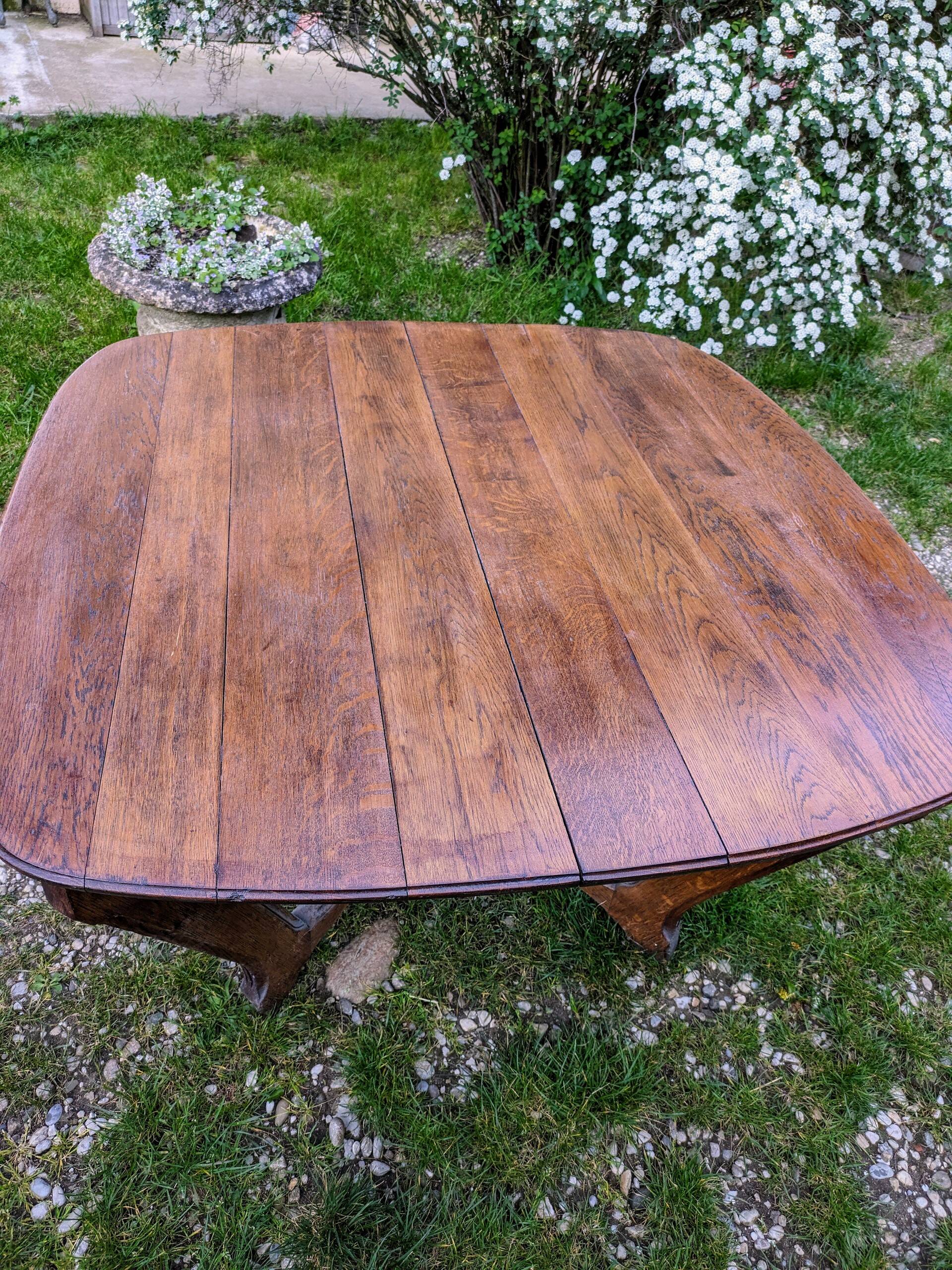 Antique Art Deco table with Eiffel-style legs in solid oak