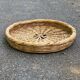 Round basket woven from straw