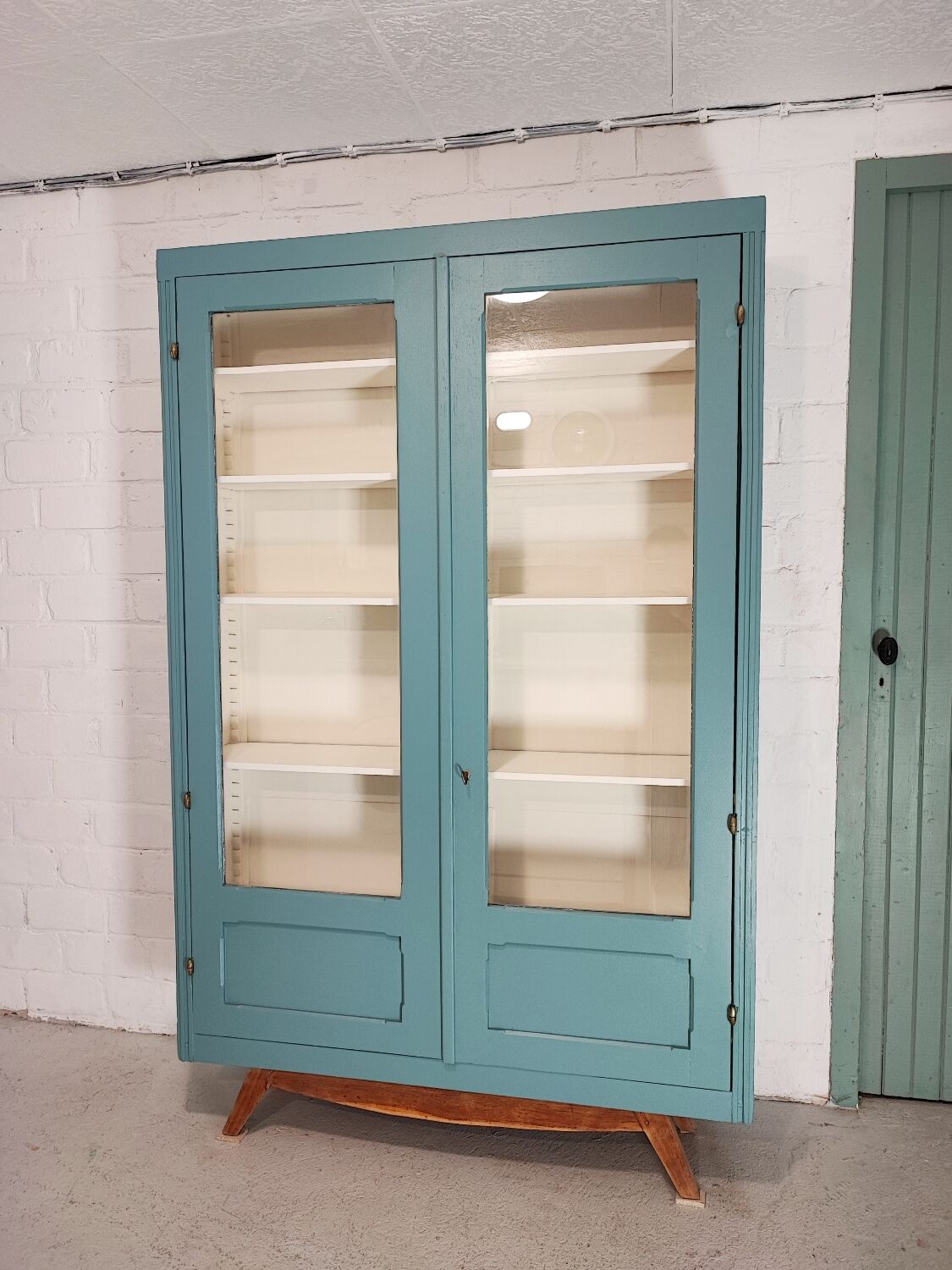 Blue vintage bookcase