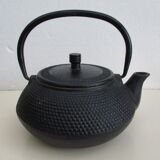Black cast iron teapot
