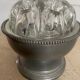 Old glass flower stick on pewter foot