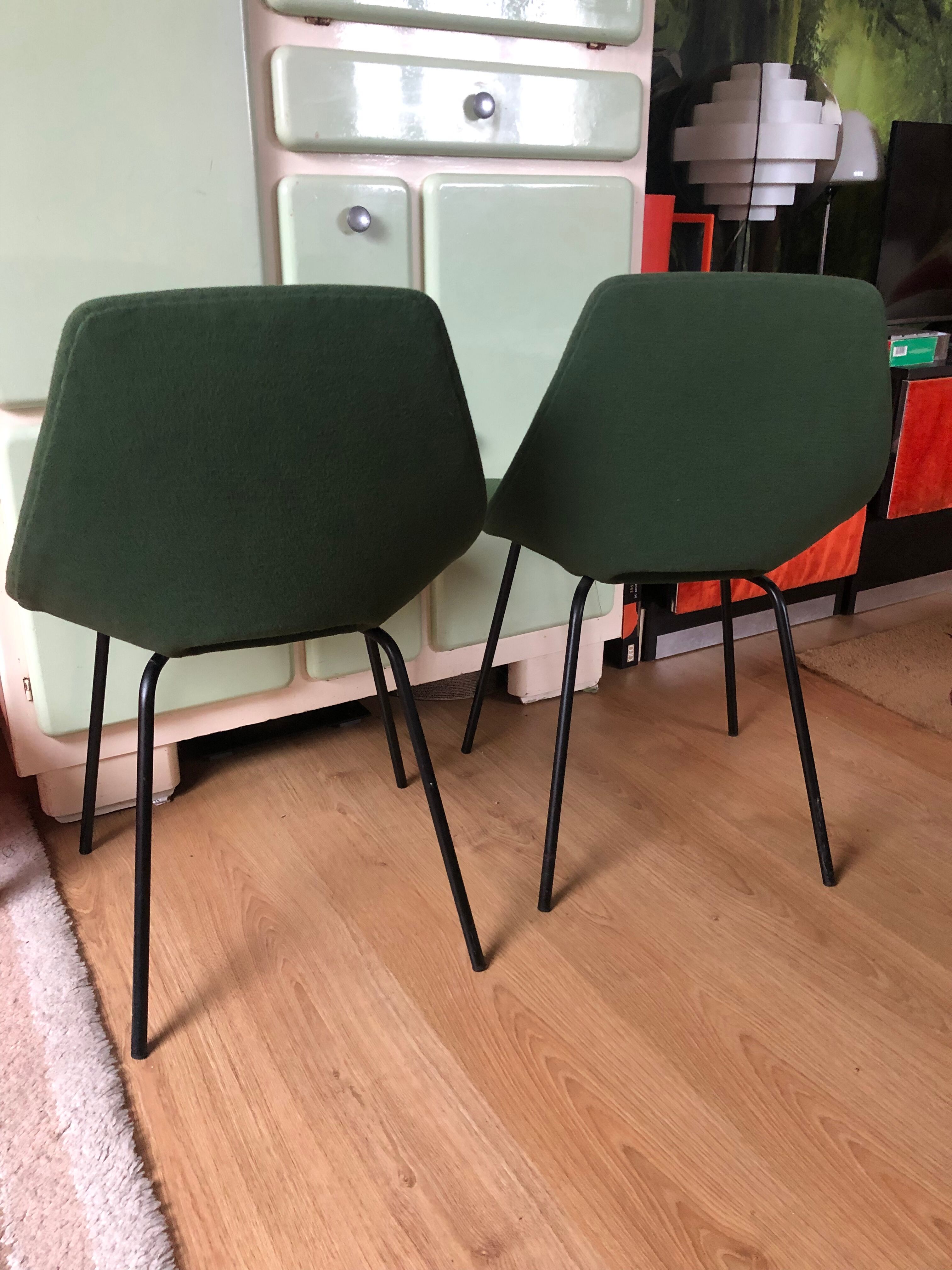 Pair of tonneau chairs by Guariche Pierre for Steiner. 50