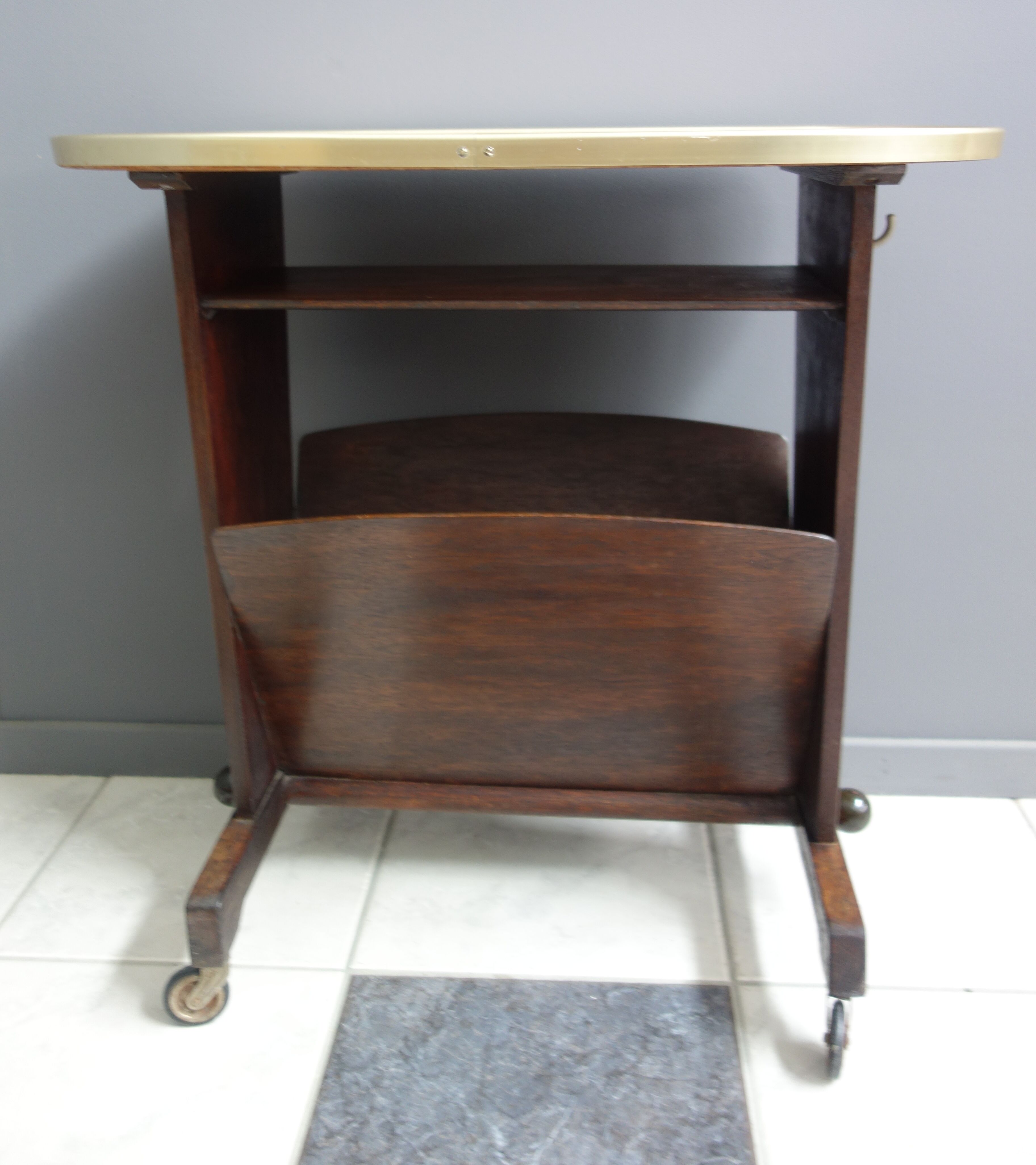 Pink formica magazine table 1950s
