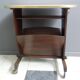 Pink formica magazine table 1950s