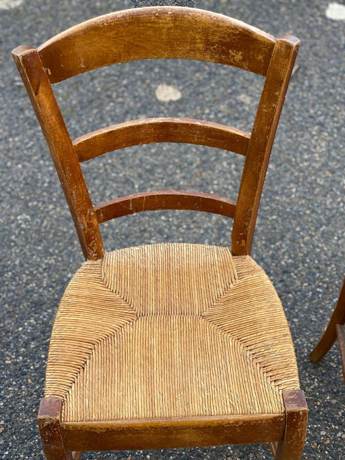 2 solid wood and straw dining chairs