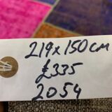 Distressed vintage turkish patchwork rug 219x150 cm wool medium