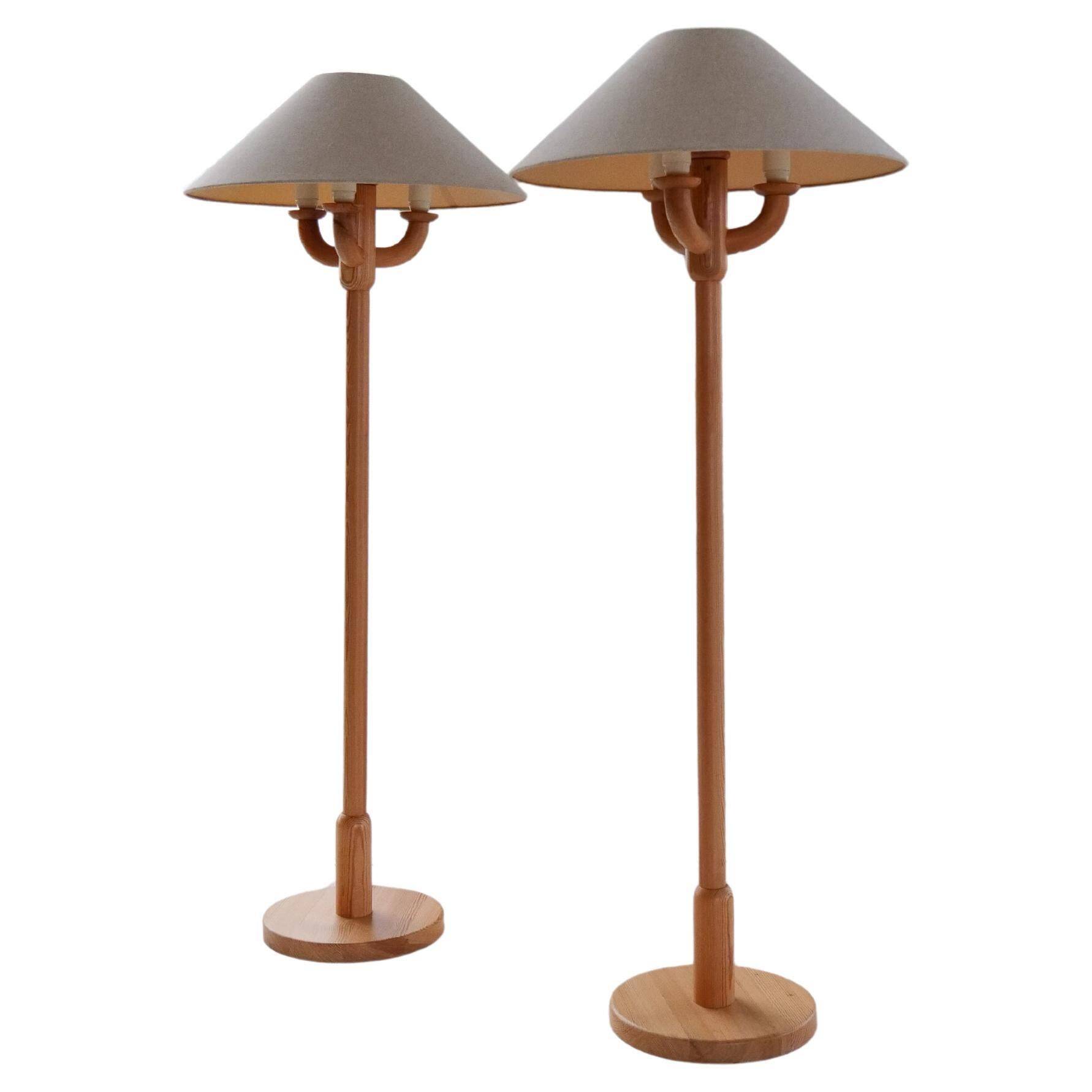 Sculptural modern floor lamps in pine, Sweden 1970s.