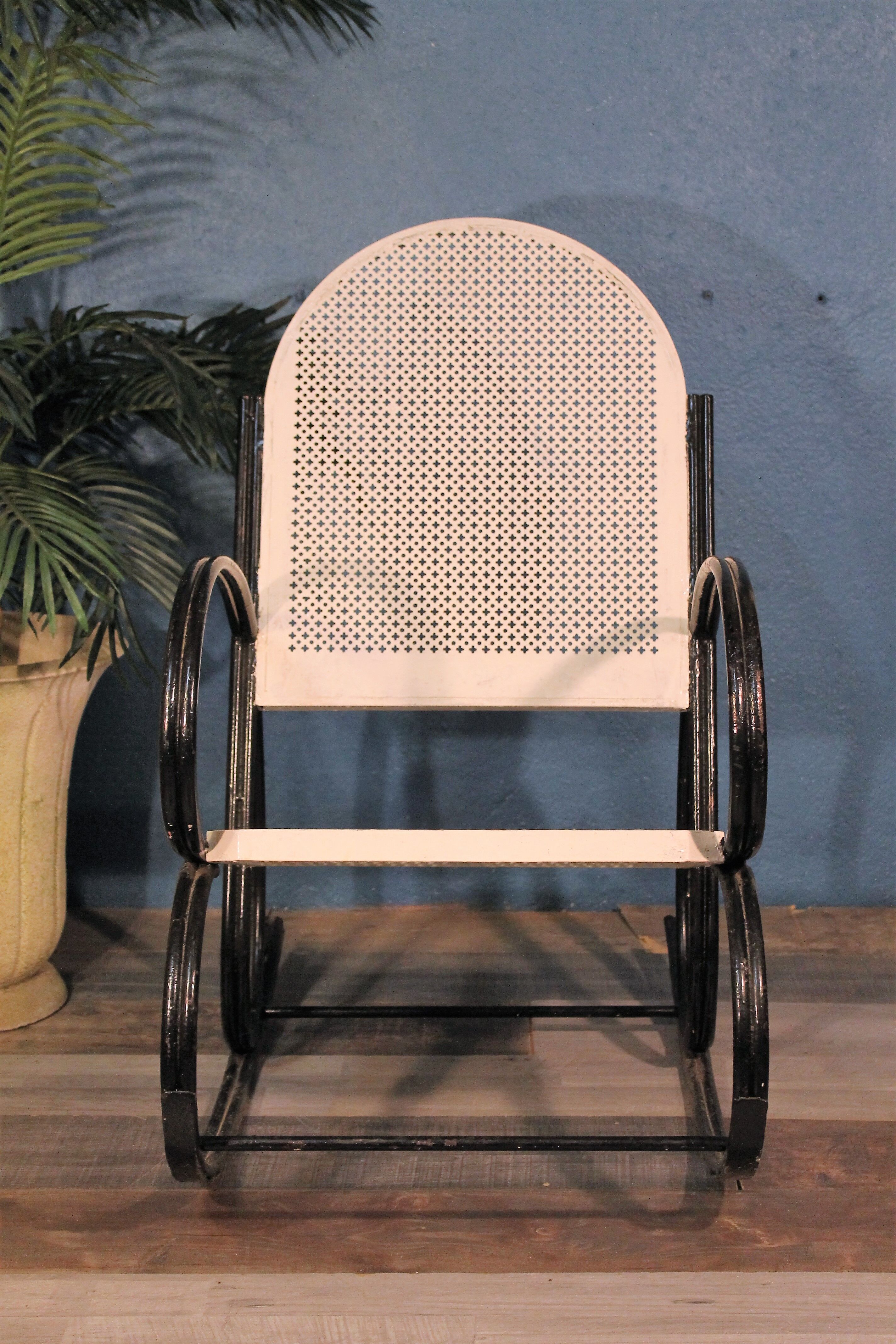 1950s perforated metal rocking chair