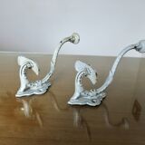 Pair of enameled cast iron coat hooks, 19th