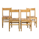 Suite of four chairs in the style of Maison Regain