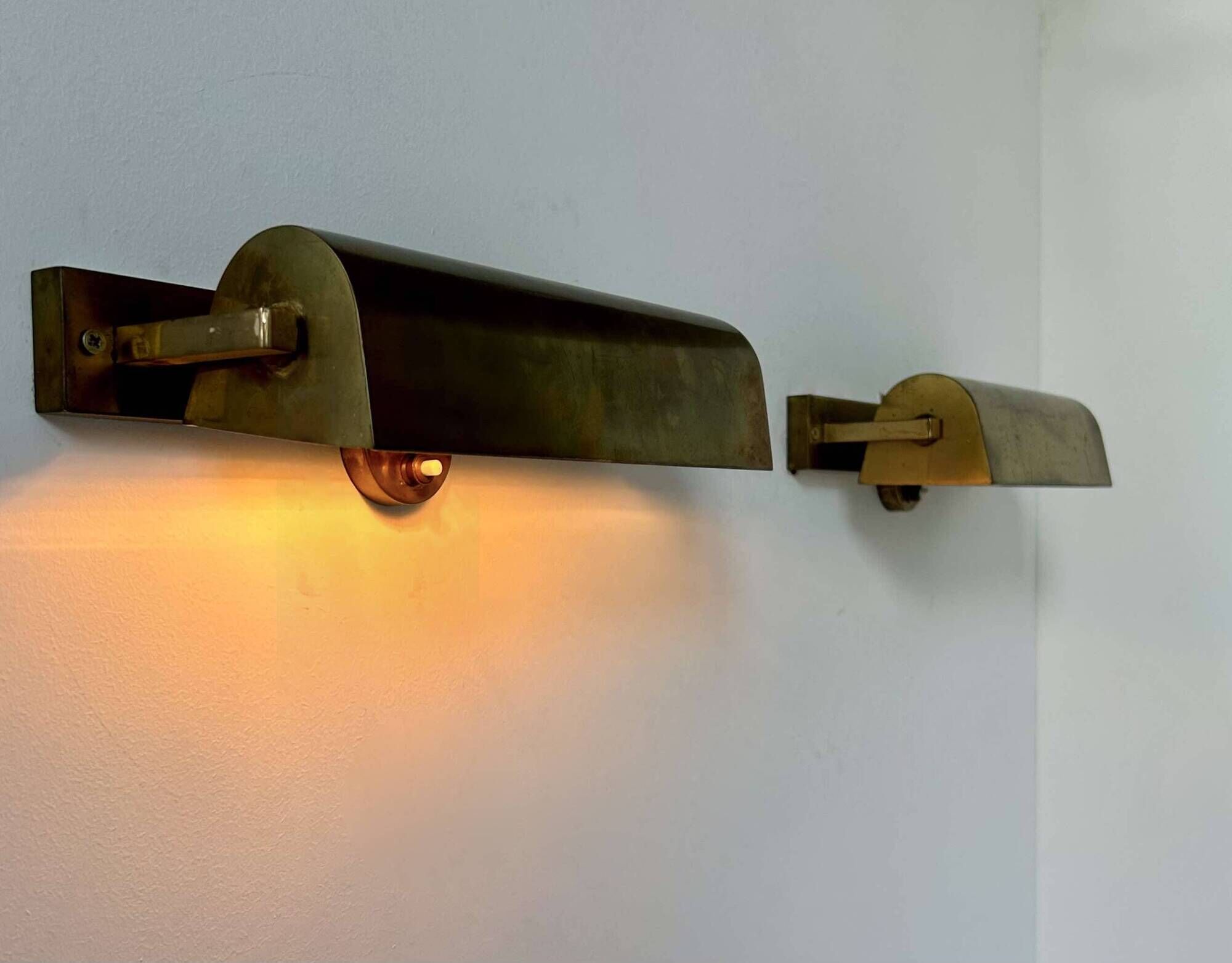 Pair of vintage modernist wall lights, adjustable in brass, France 1940