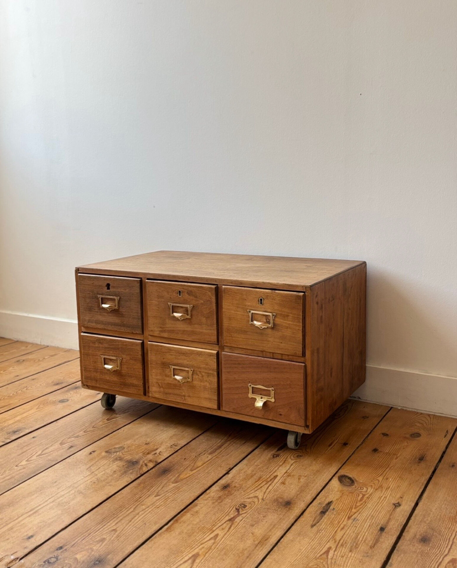 Small antique work cabinet with 6 drawers.