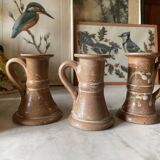 Trio of stoneware candle holders
