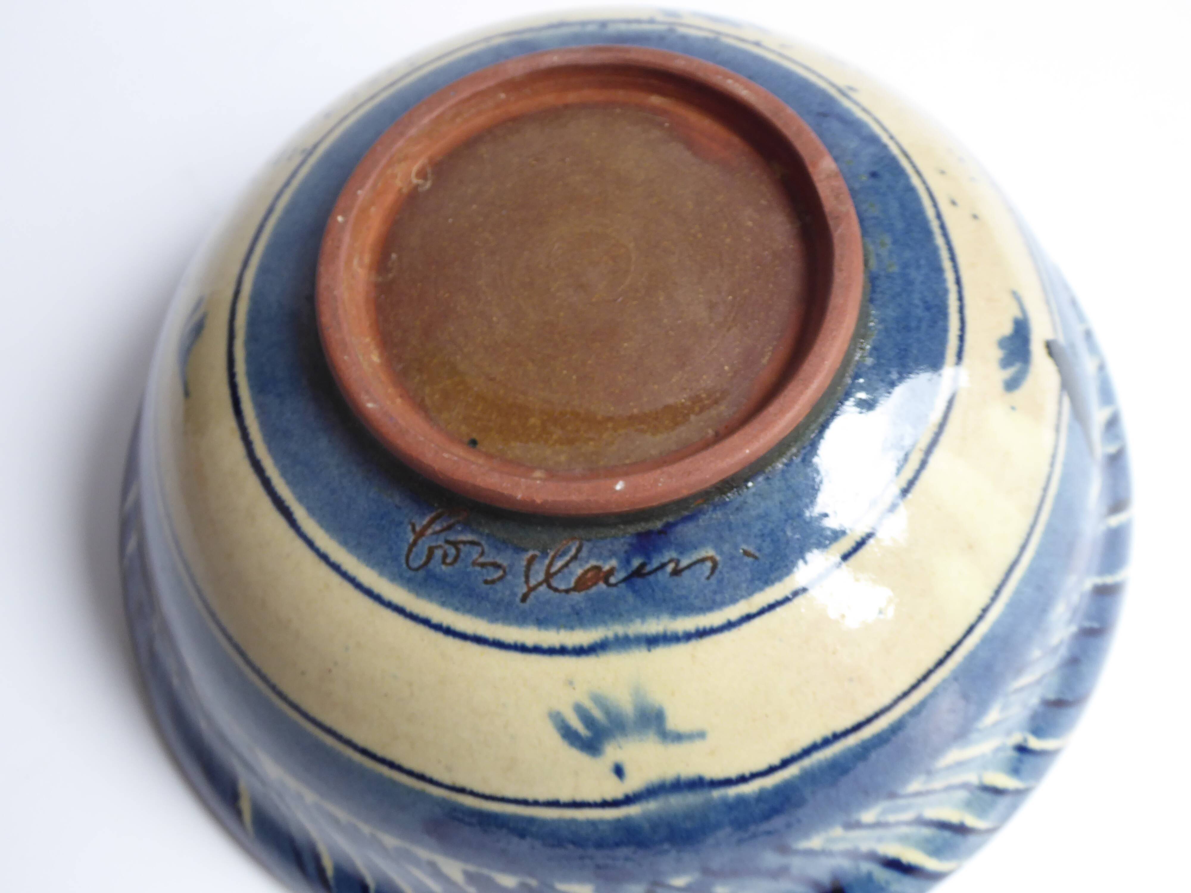 Blue enamelled terracotta cup