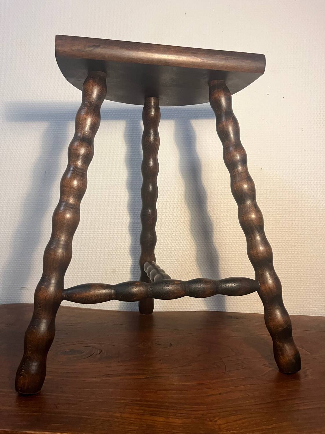 Solid wood tripod stool with turned legs