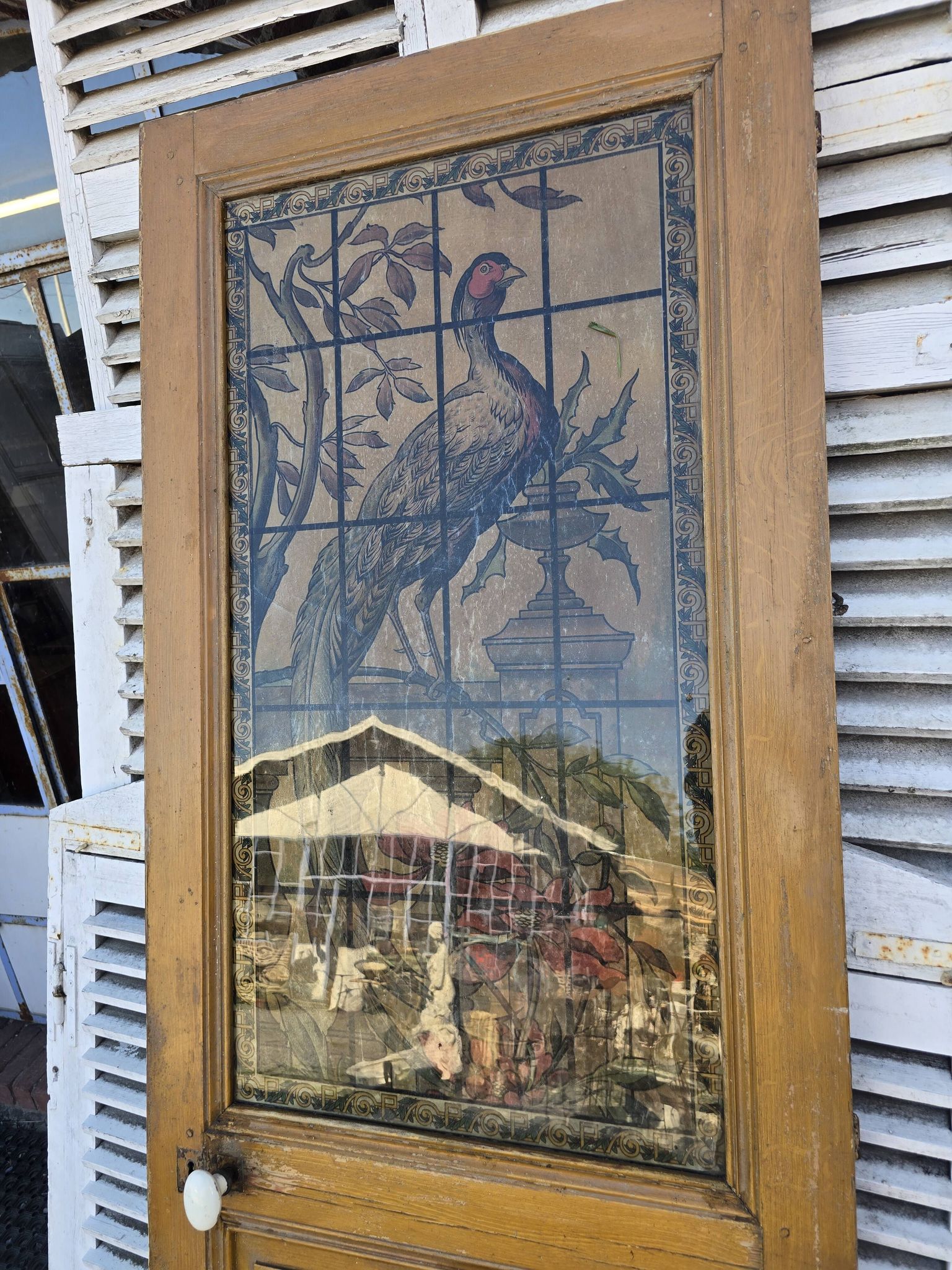 old door with decorated window